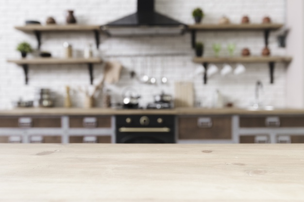 tabletop-with-stylish-modern-kitchen-background_23-2148238620